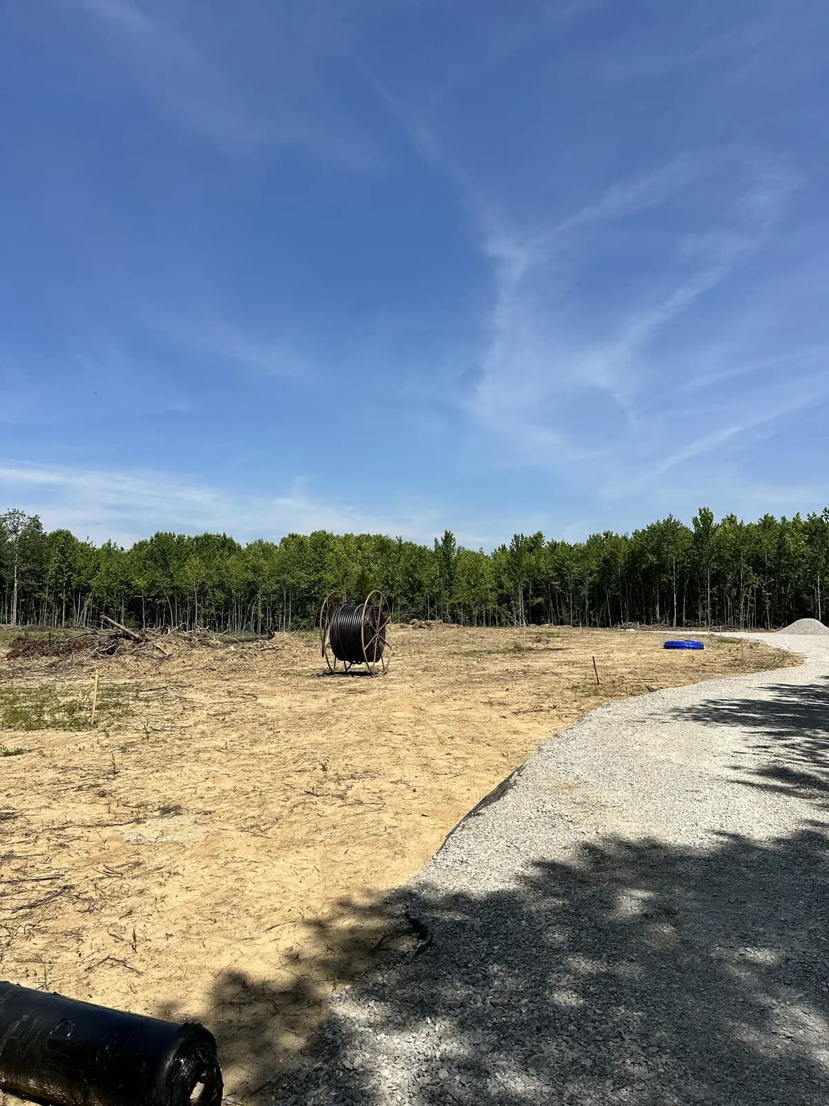 A cleared and graded cabin site on the property