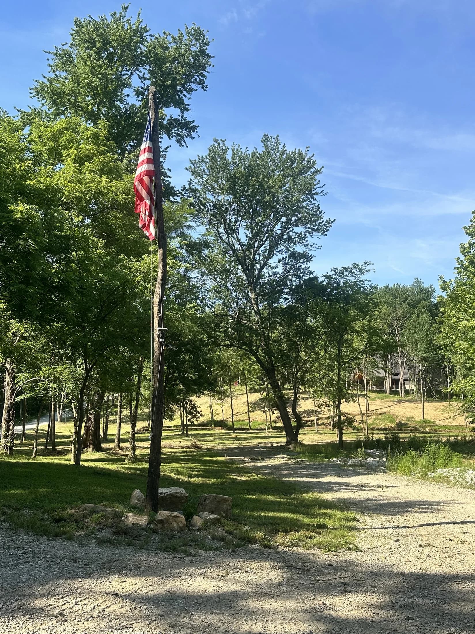 The American flag flying over the sanctuary grounds