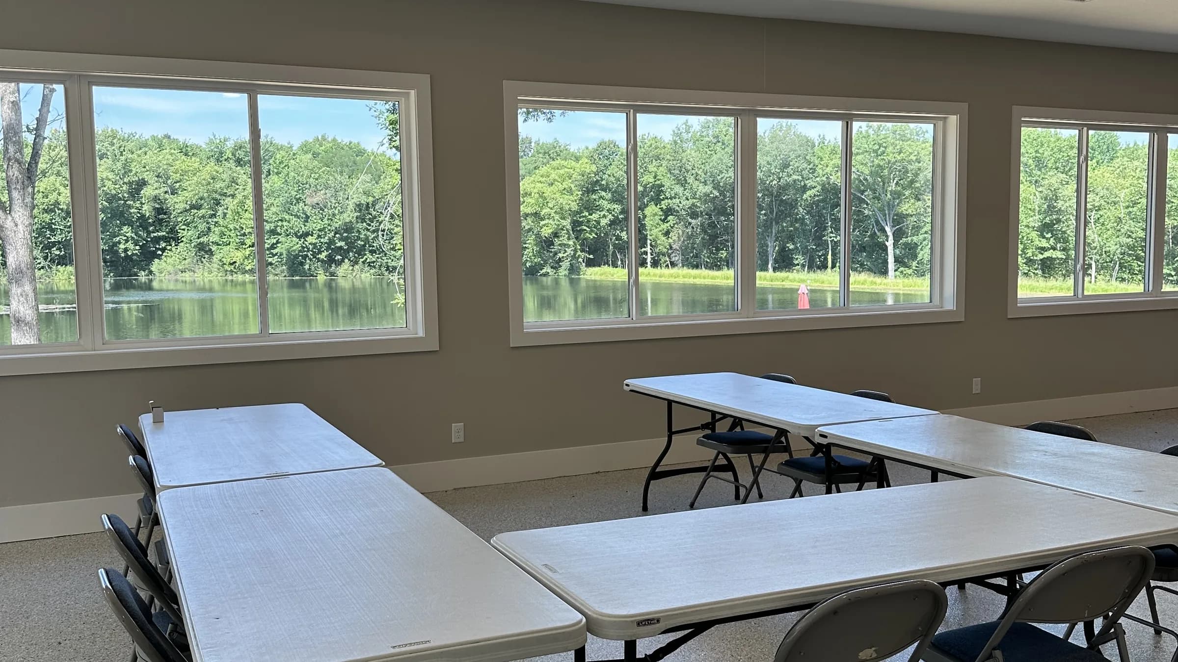 The activity center interior, windows overlooking the lake